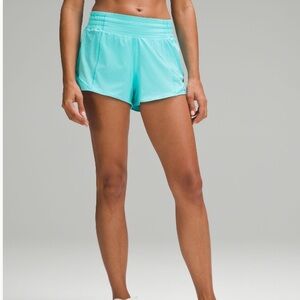 Lululemon Hotty Hot High-Rise Lined Short 2.5” in electric turquoise.